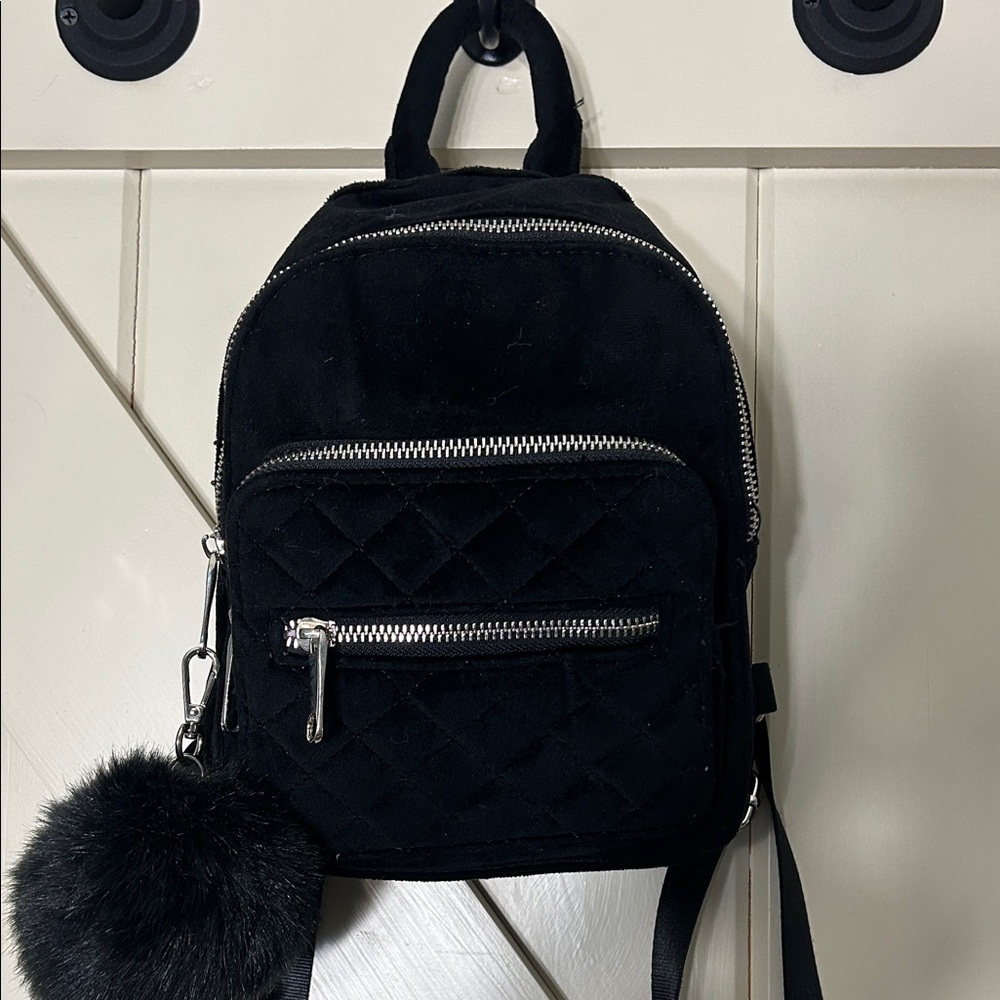 Candies Black Velvet Quilted Backpack with Pom Pom.